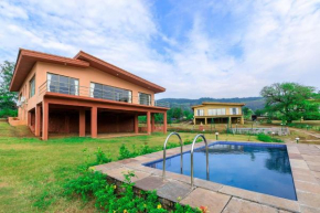 StayVista's Shivom Villa 3 - A Serene Escape with Views of the Valley and Lake
